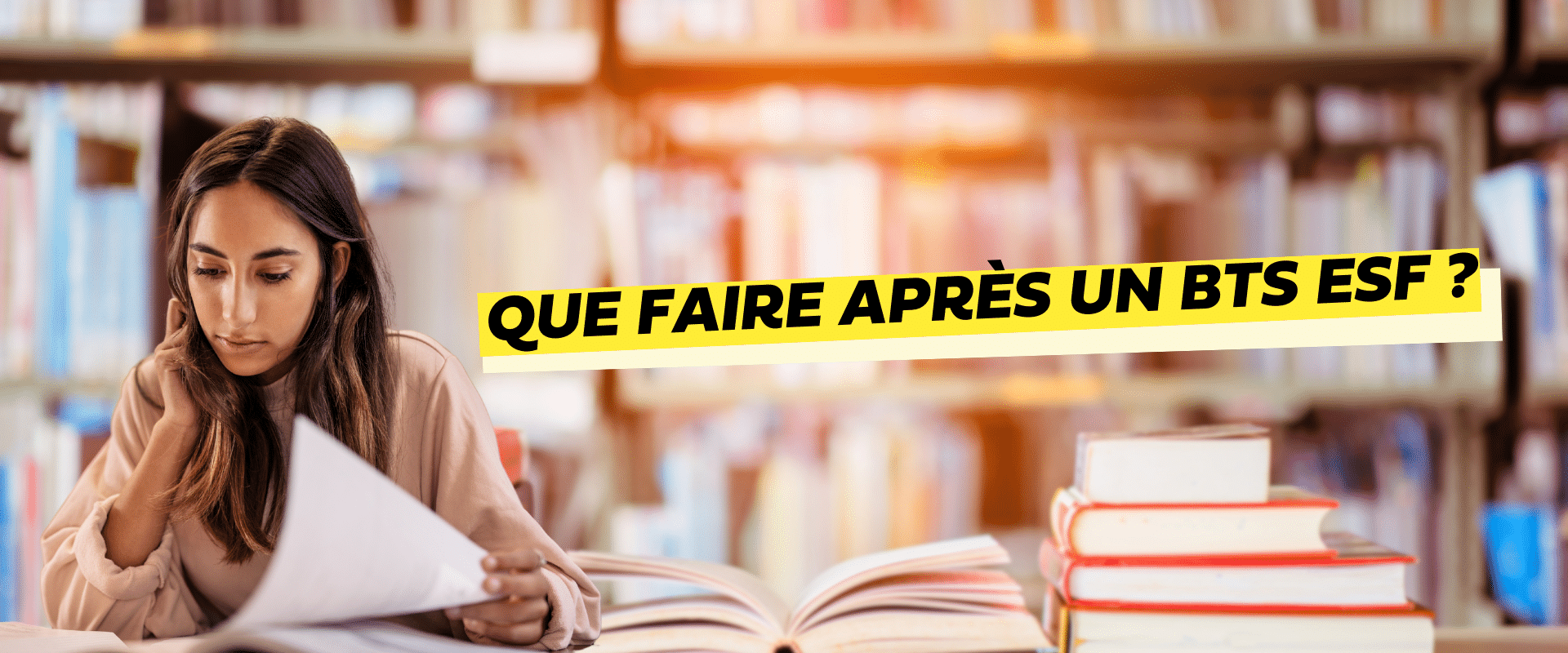 une fille en train d'étudier un livre Que faire après un BTS ESF ?